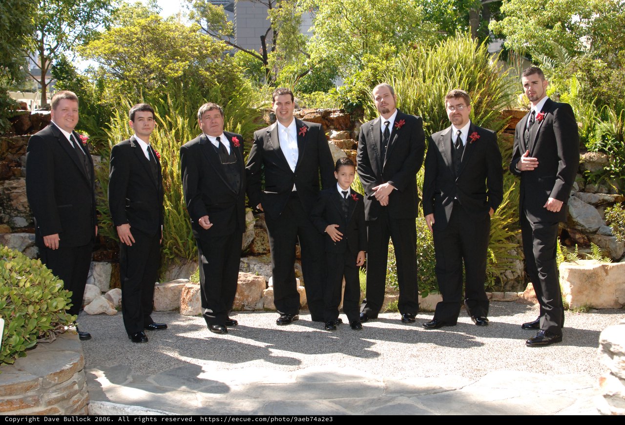 Groomsmen Pose in Garden Before Wedding Ceremony