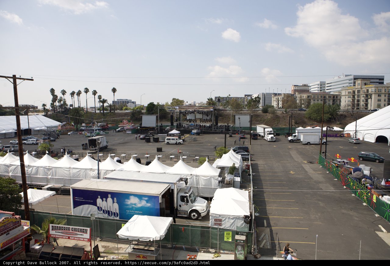 Busy Parking Lot with White Tents