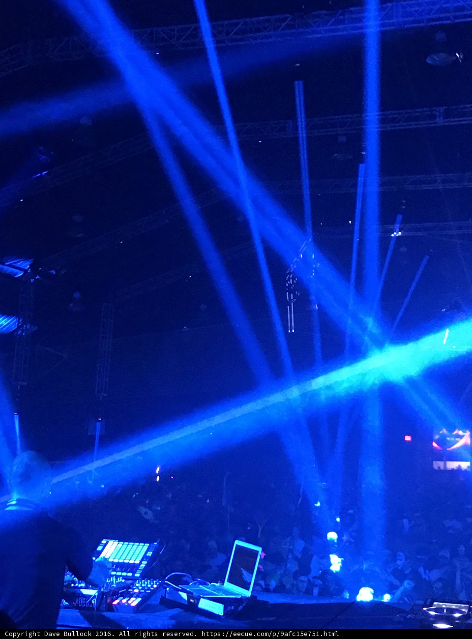 Nightclub Rock Concert with DJ and Blue Lighting
