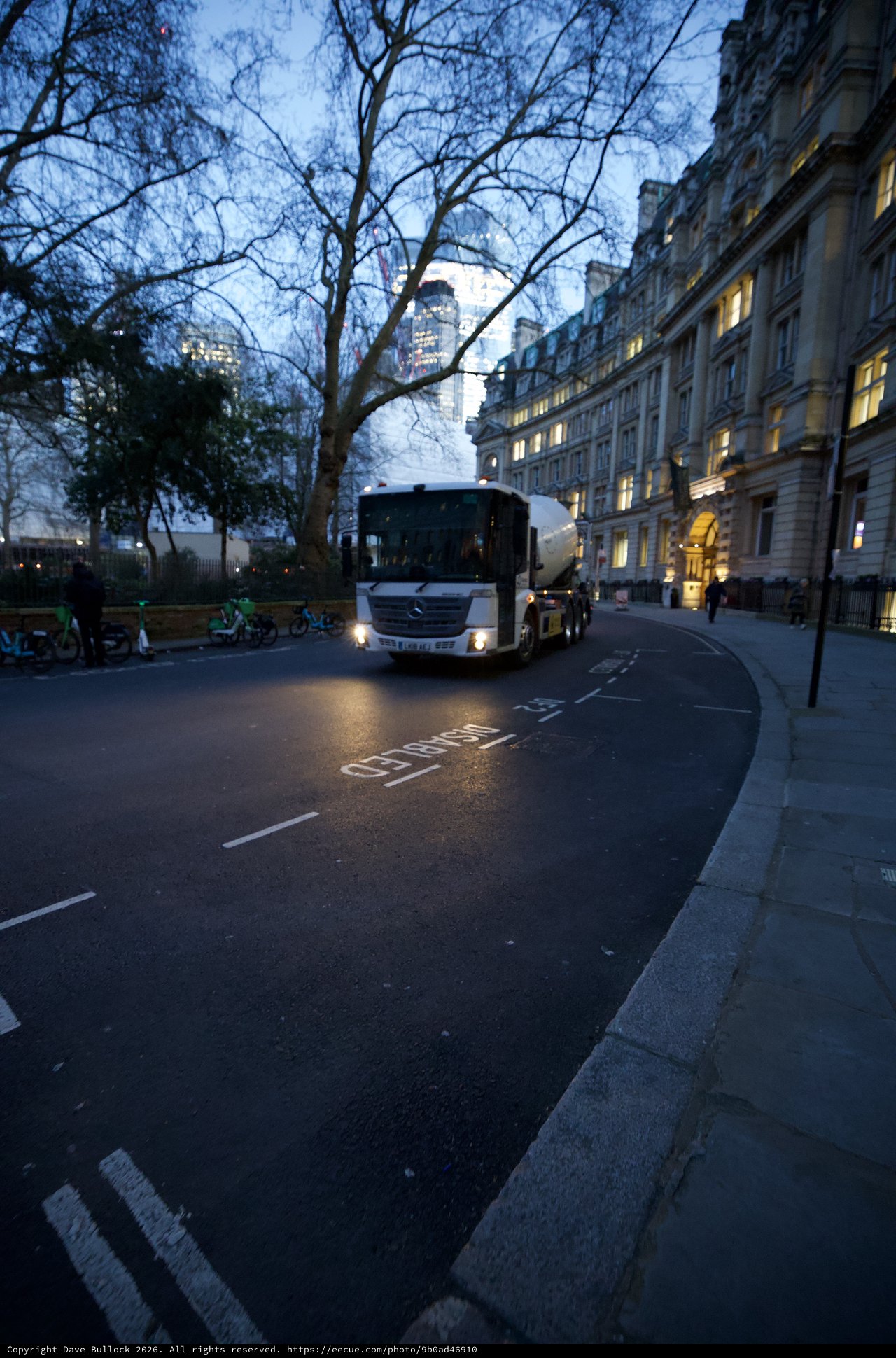 White Cement Truck on London Street at Dusk