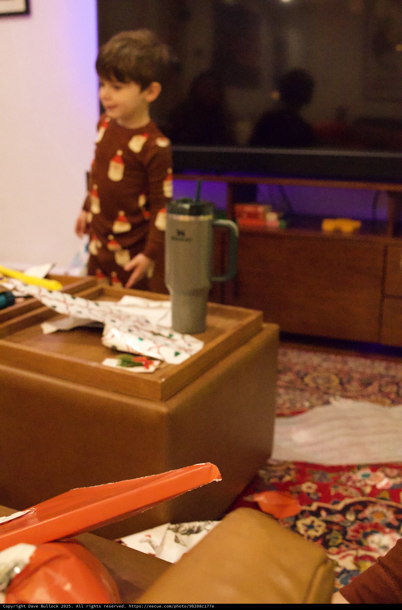 Christmas Morning Unwrapping in Cozy Living Room