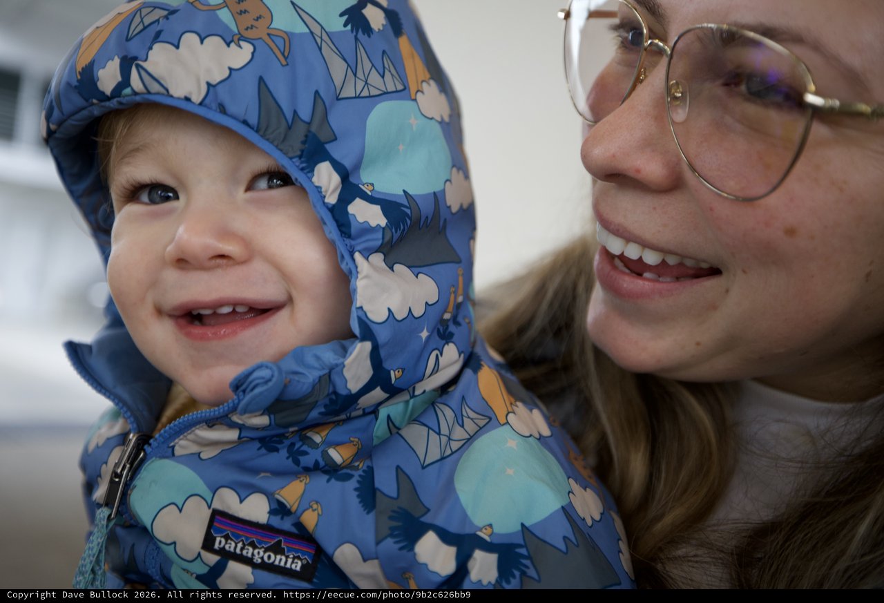 Joyful Winter Moment: Mother and Child in Blue Patagonia