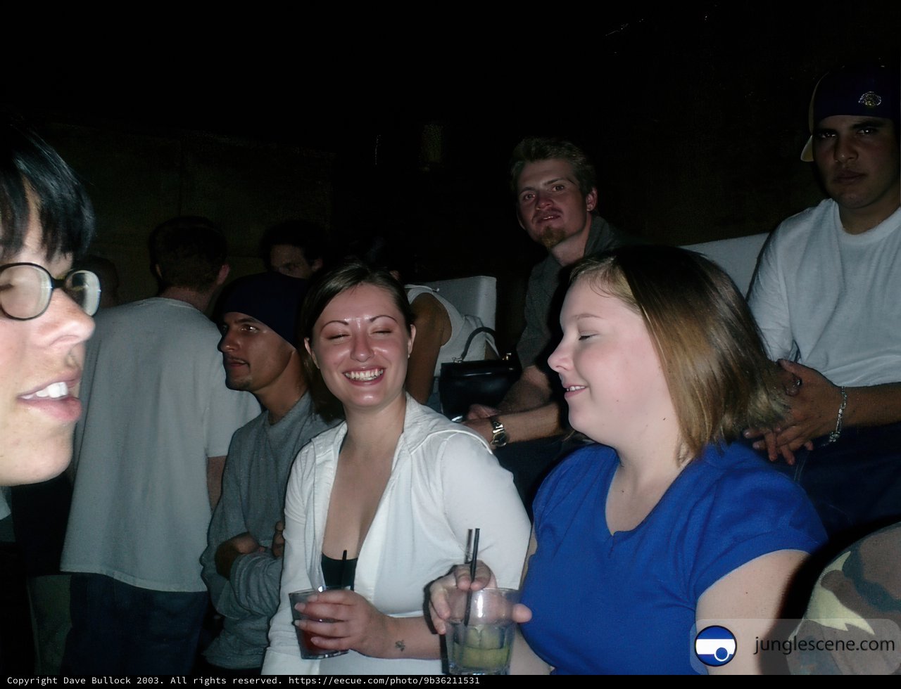 Group of Friends Enjoying Night Out at Urban Pub
