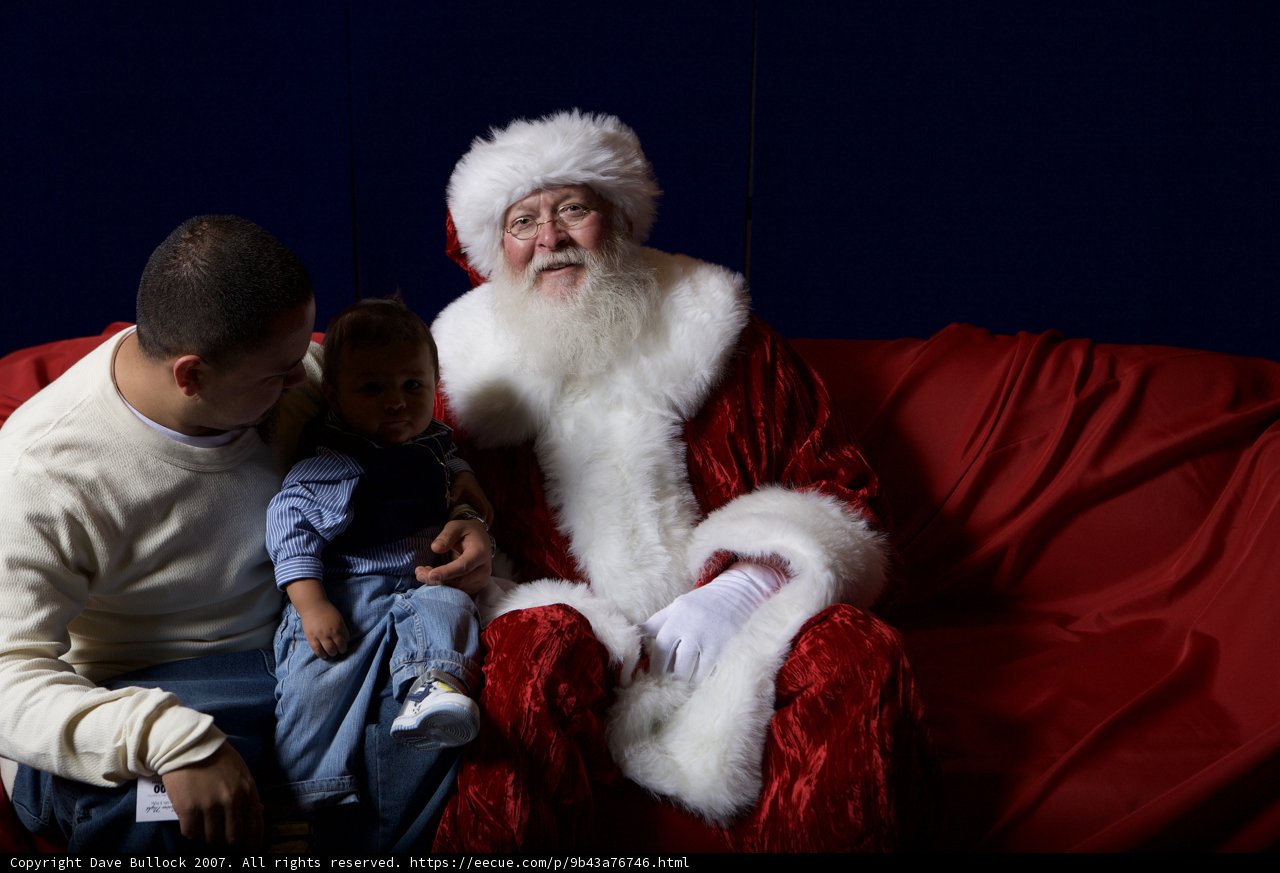 Santa, Baby, and a Red Couch