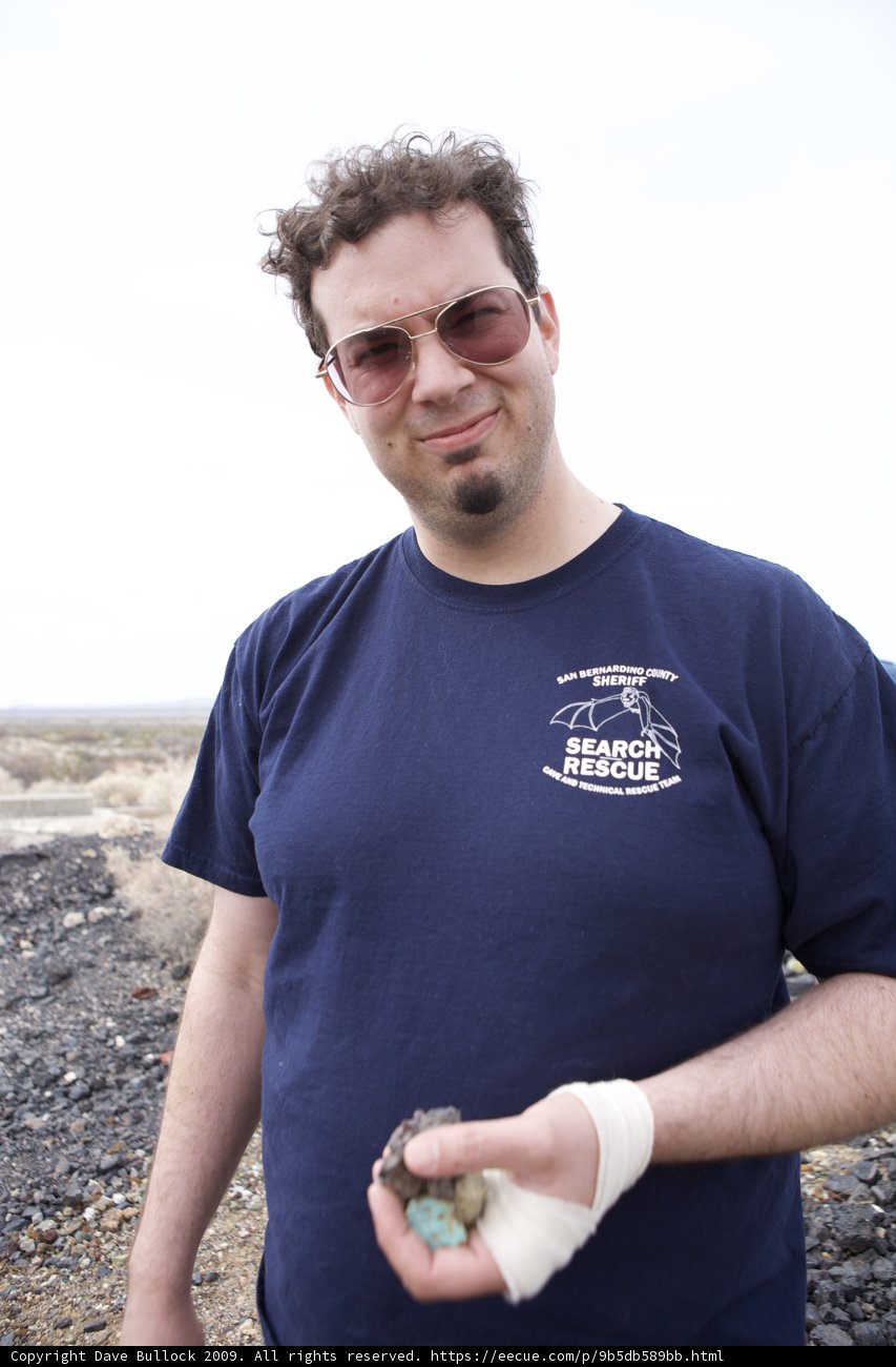 Portrait of a Man Holding a Rock