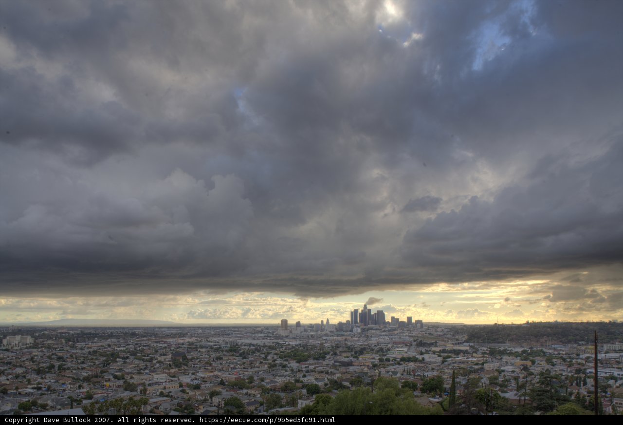 Urban Skylines Beneath Cumulus Clouds