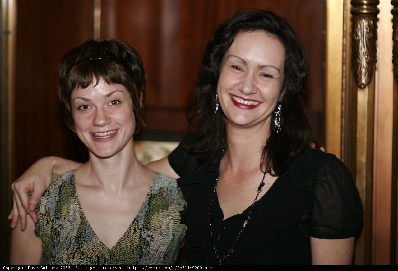 Downtown Art Ride: Two Women in Evening Dresses Smile for the Camera