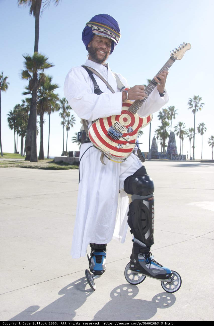 Man with Helmet and Guitar