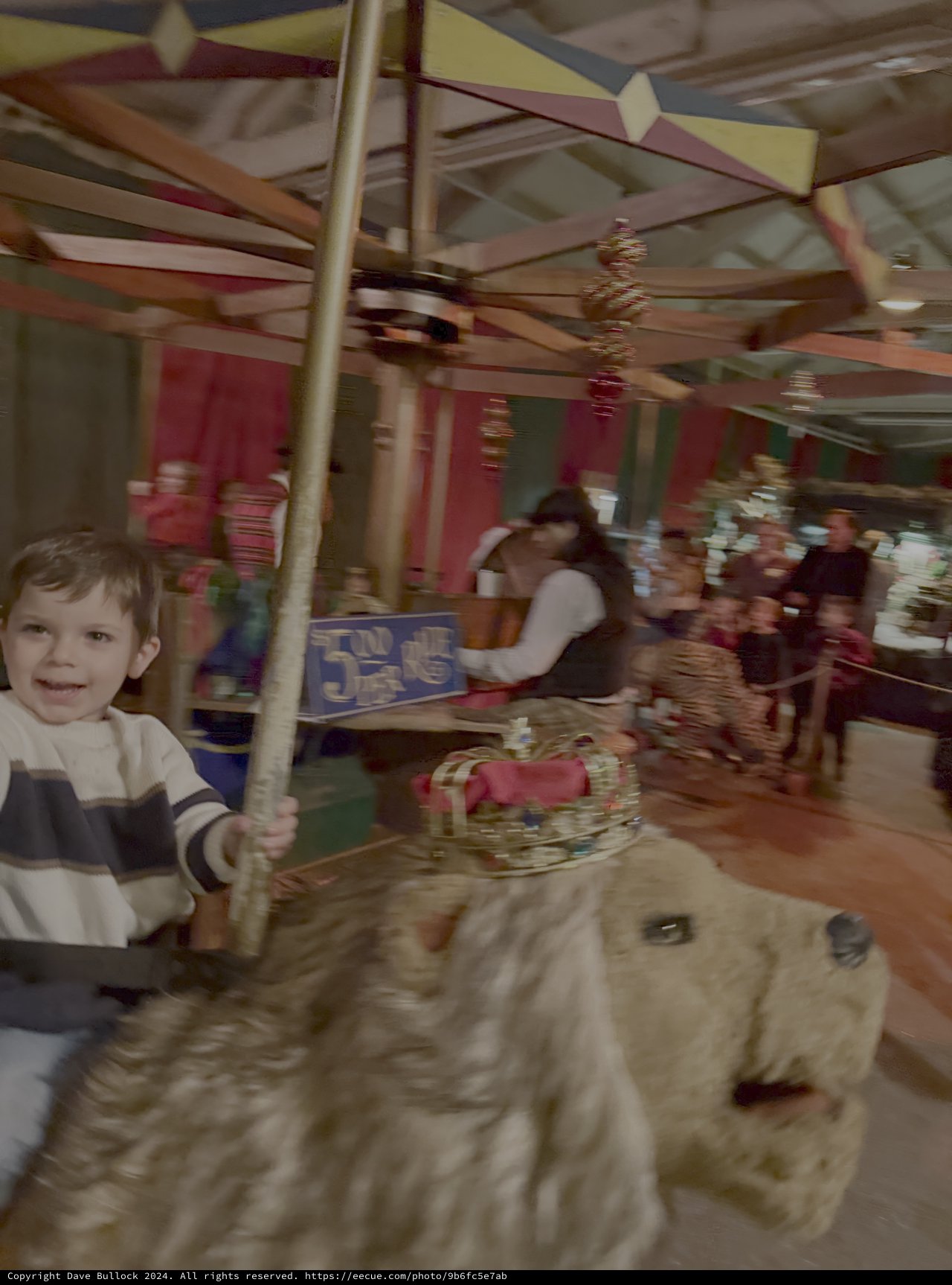Child and Dog on Carousel Ride