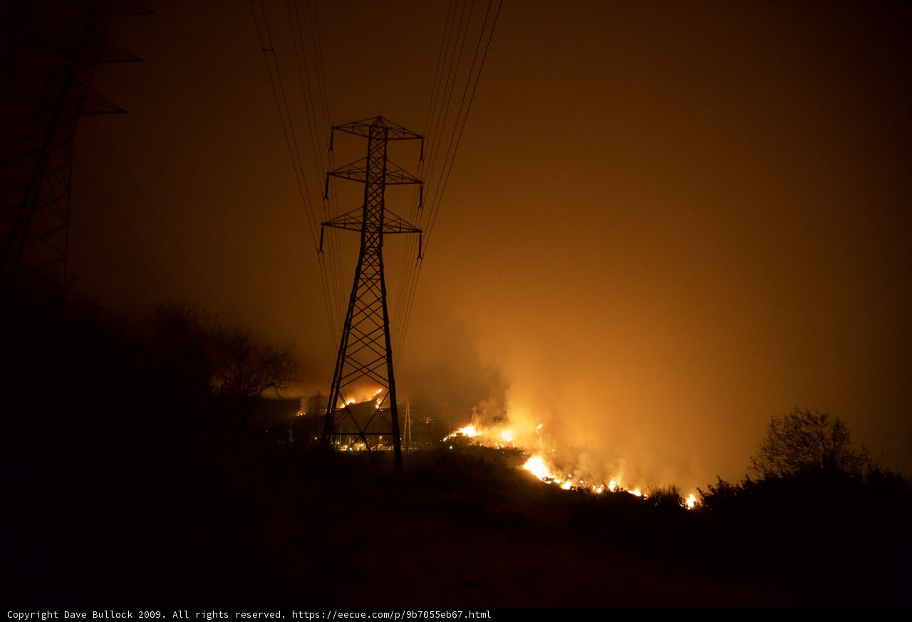 Flames Threaten Power Lines
