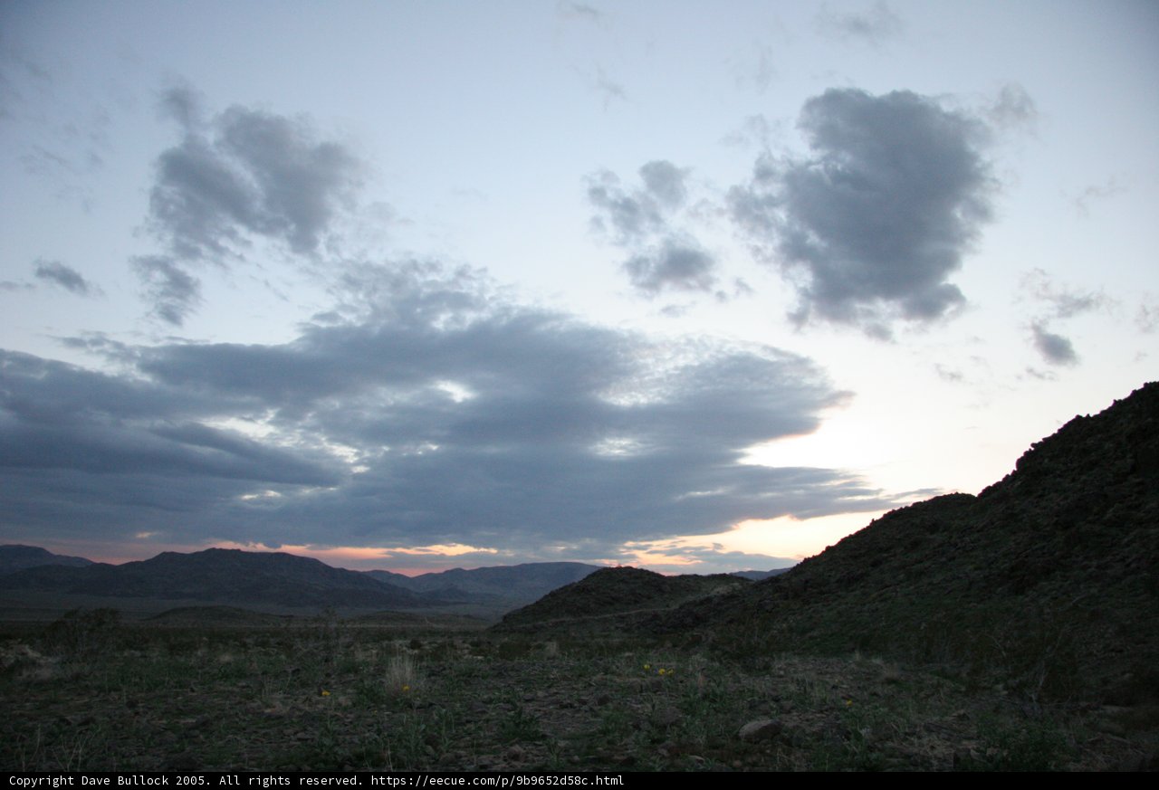 Cloudy Sunset over Hilltop Plateau