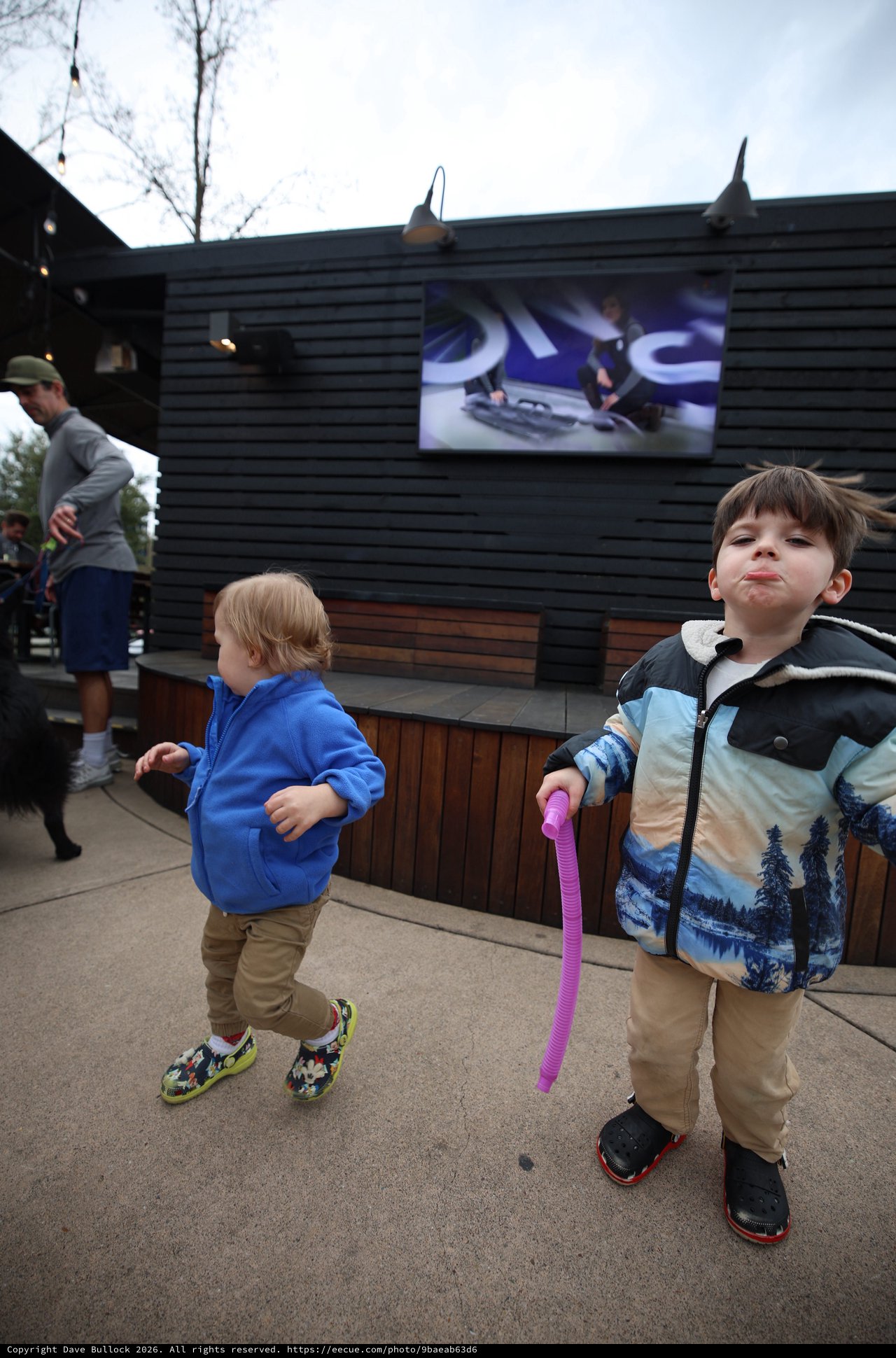 Children Making Silly Faces at Outdoor Venue