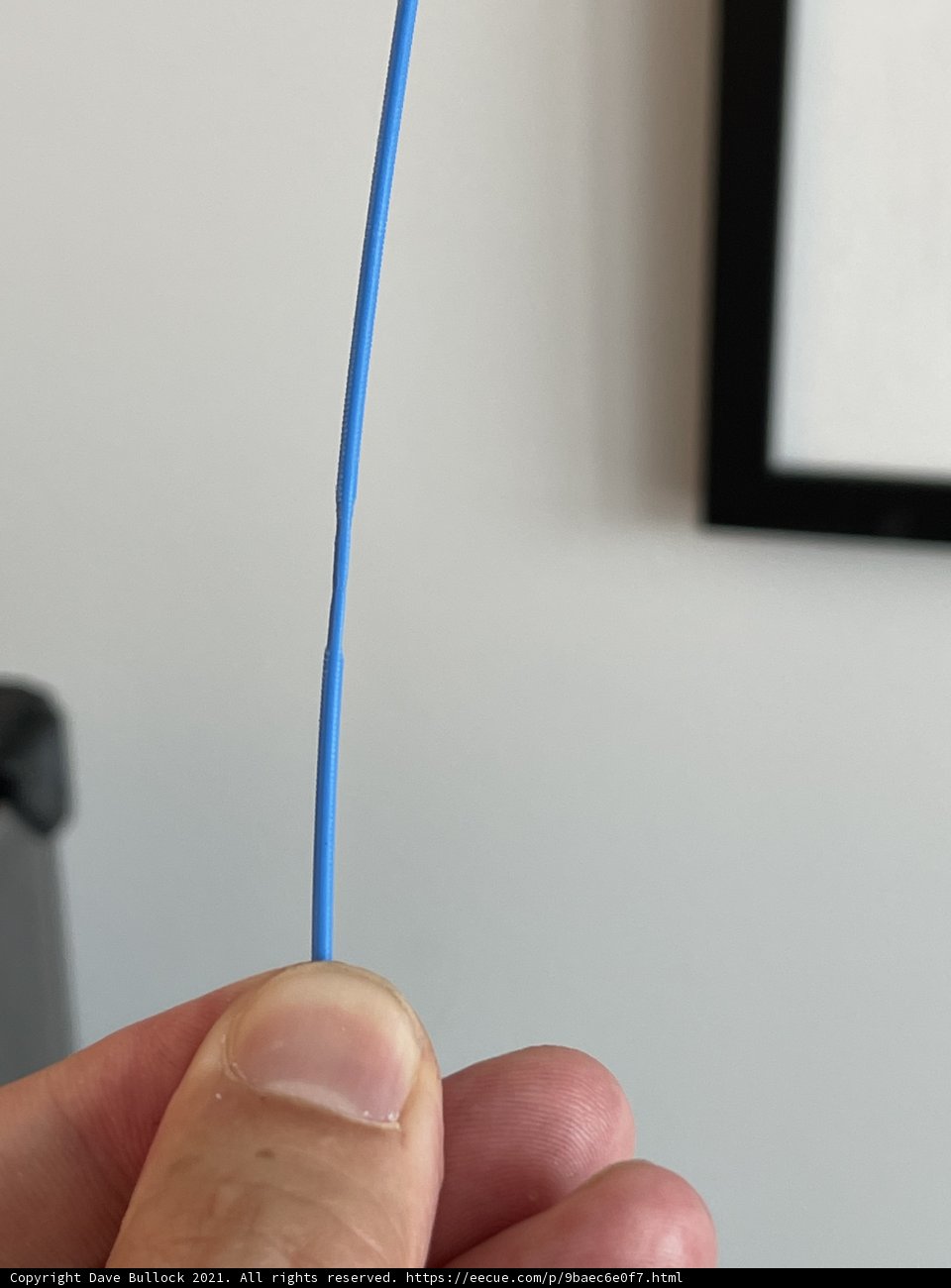 The Blue Cord Holder