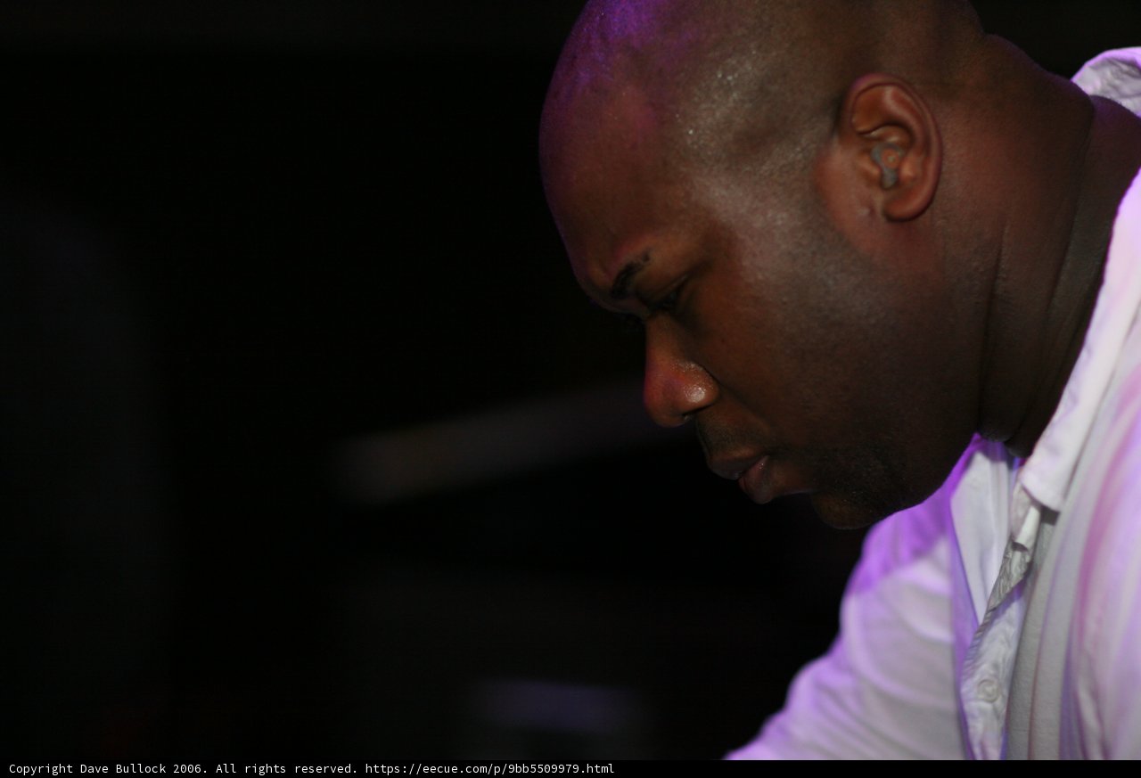 Contemplative Man in White Shirt