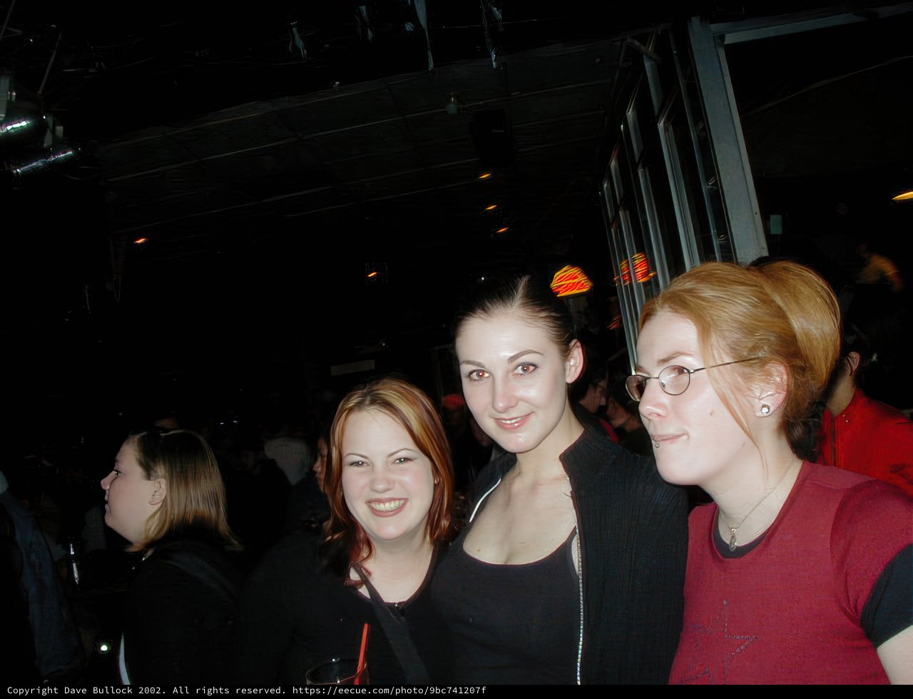 Red Shirted Woman in the Nightclub