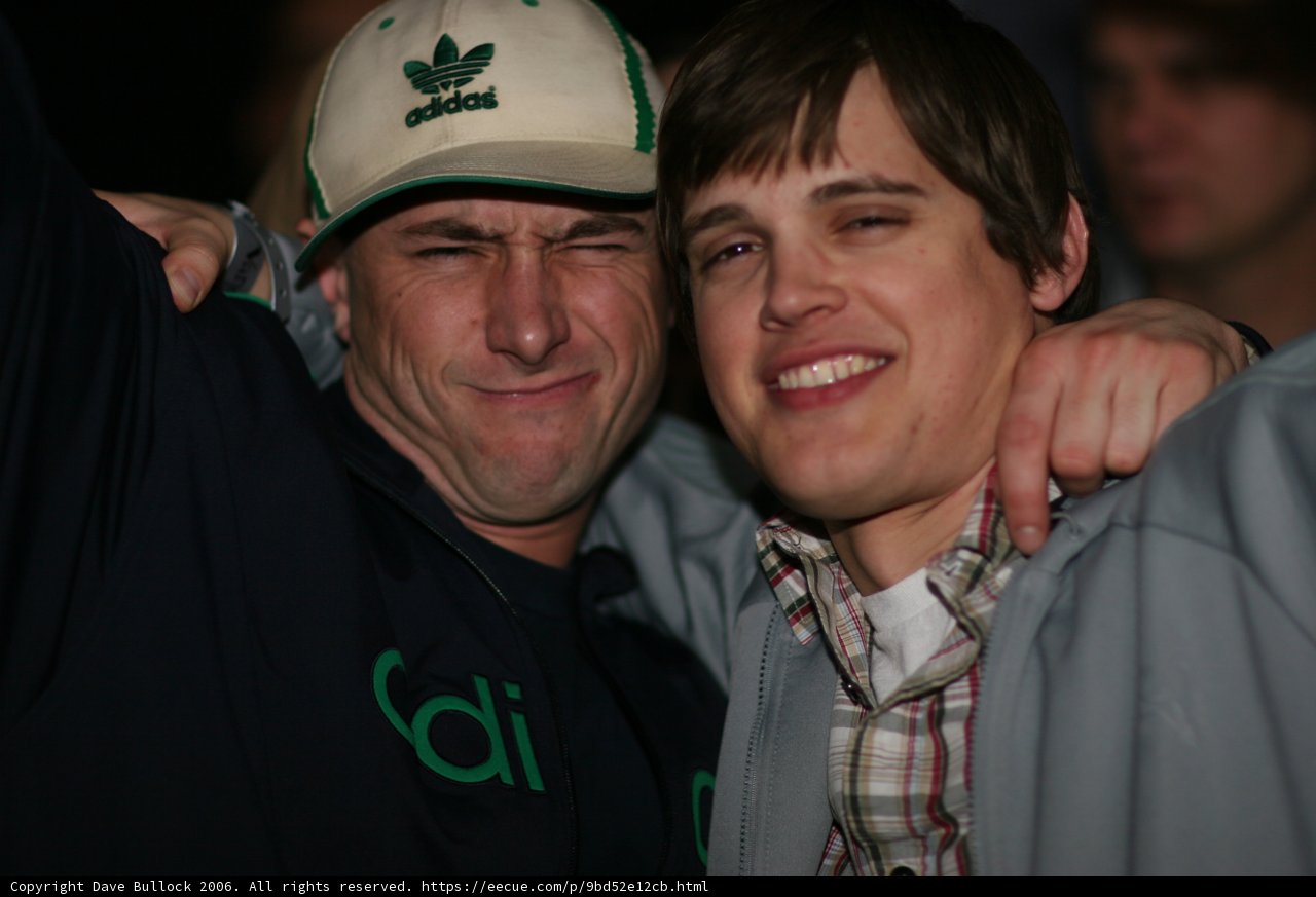 Blue Shirted Man with a Baseball Cap