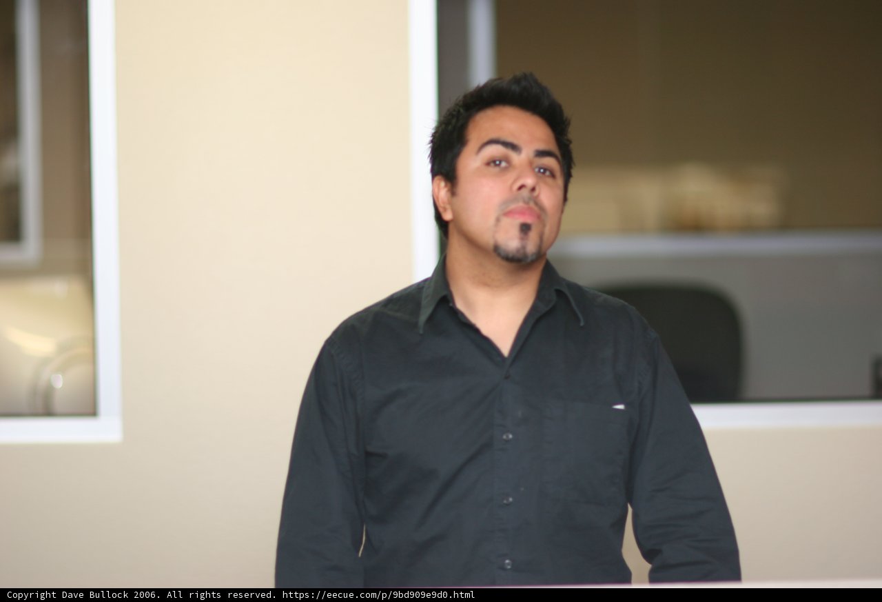 Black Shirted Man Smiling