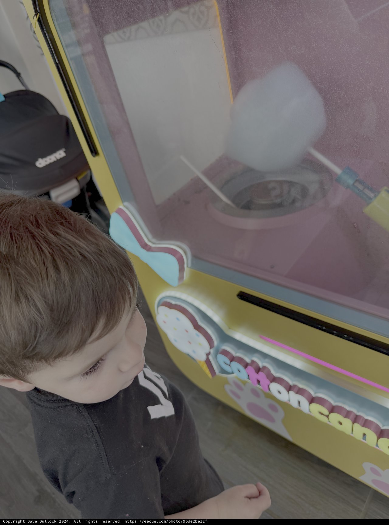 Child Playing Arcade Cotton Candy Game