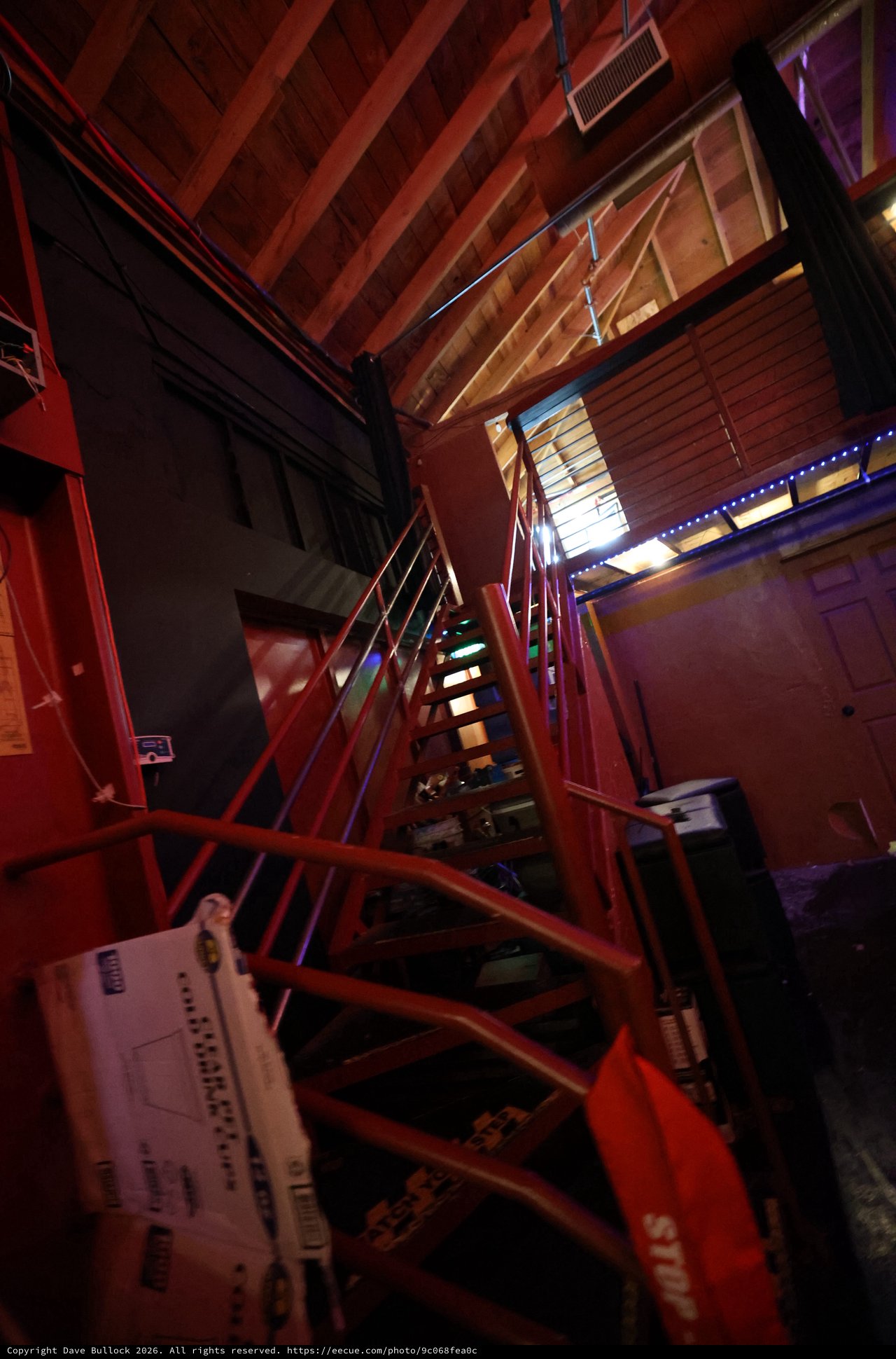 Red Steel Staircase in a Dark Music Venue