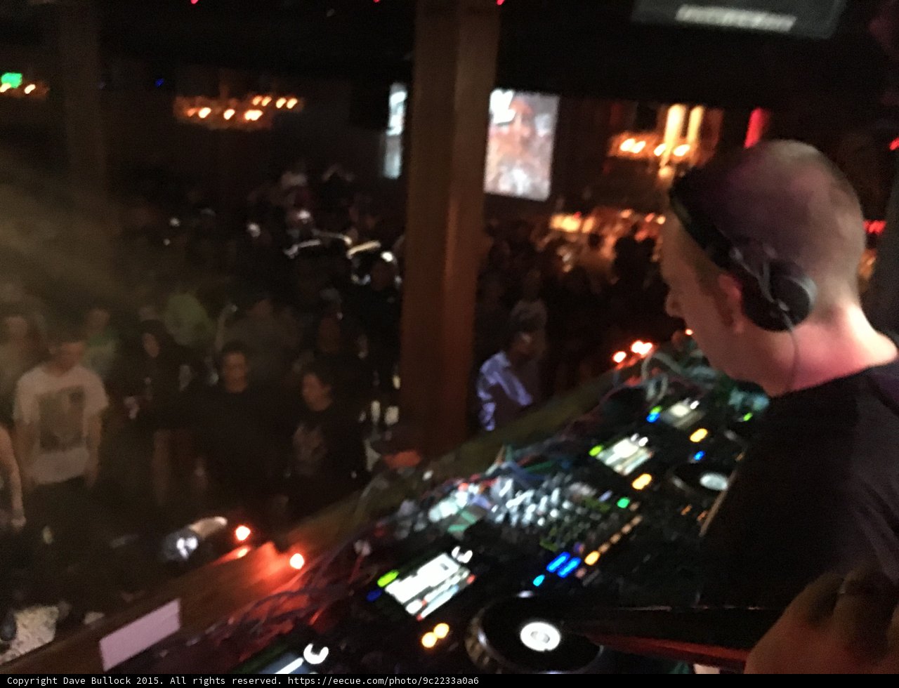 Nightclub DJ Performs for Enthusiastic Crowd