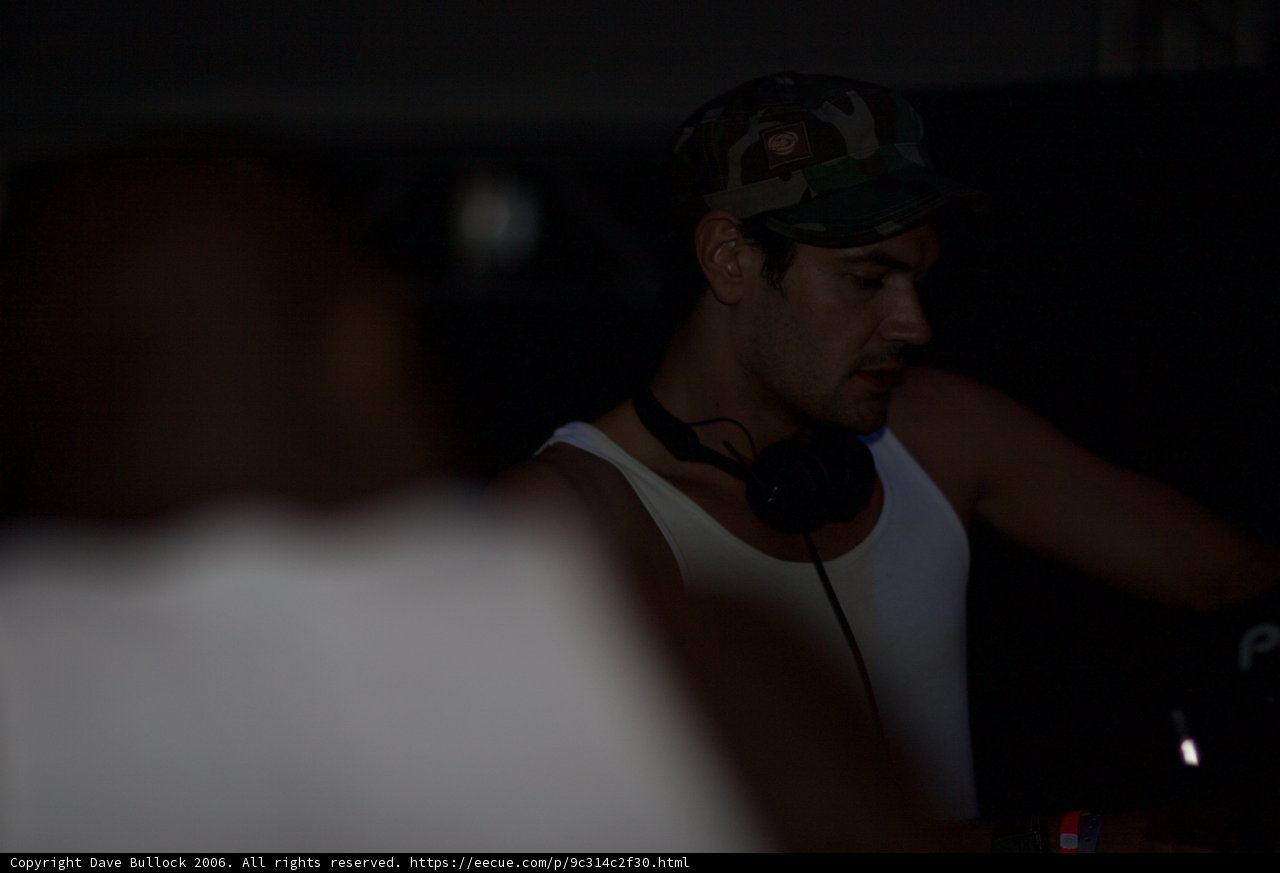 White Tank Top and Baseball Cap