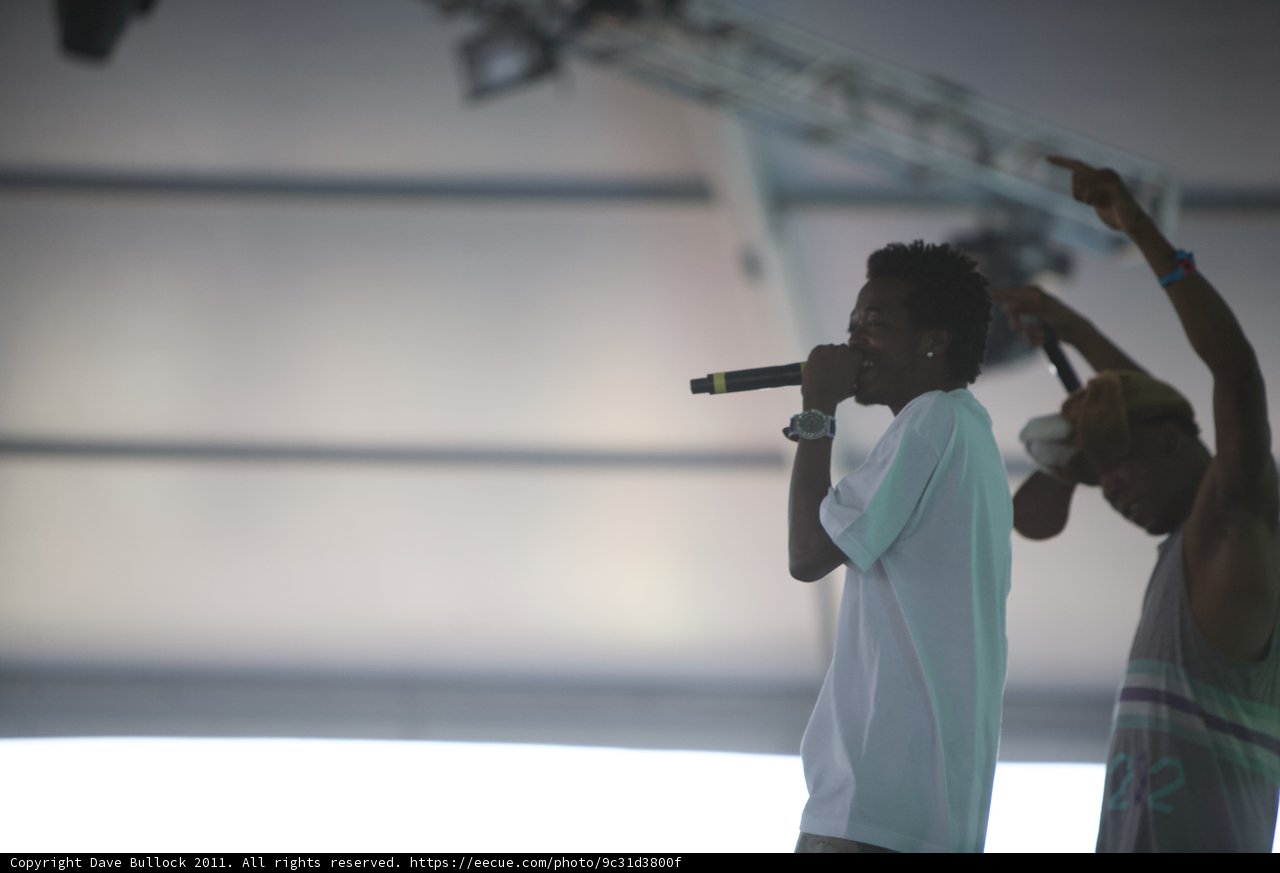 Two Men Rocking the Stage with Microphones
