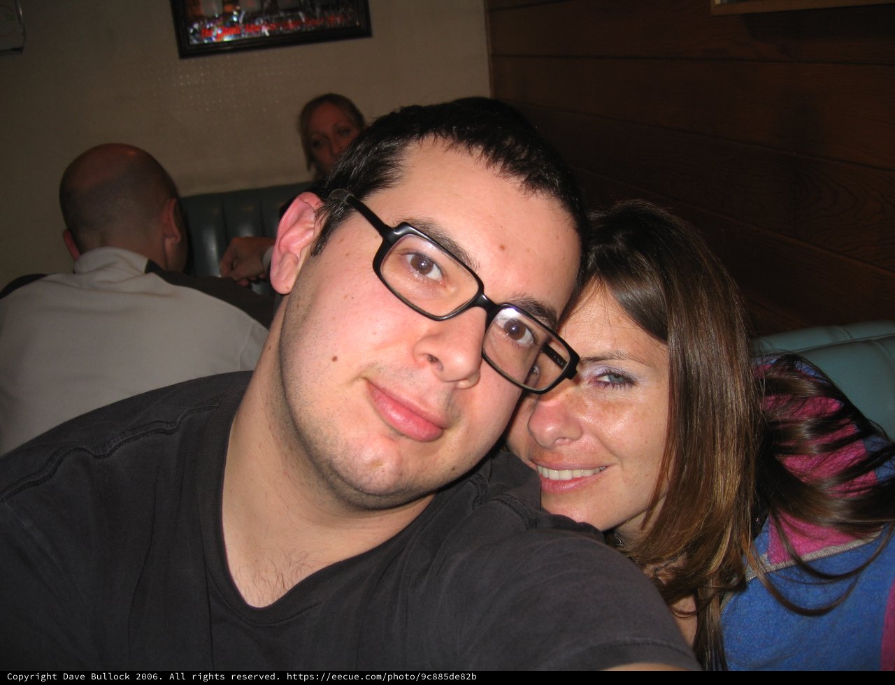 Friends Posing Close Together at a Casual Bar