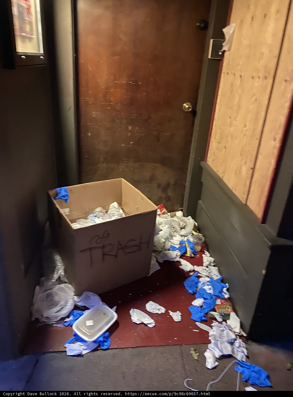 Trash Can Next to Door