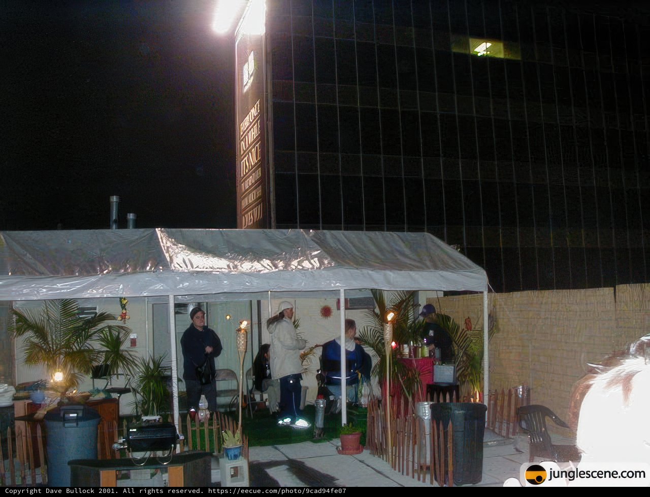 Nighttime Gathering Under a Tent