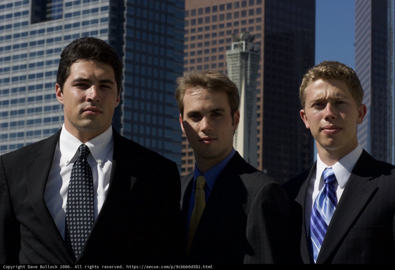 Three Men in Sharp Suits Take on the City