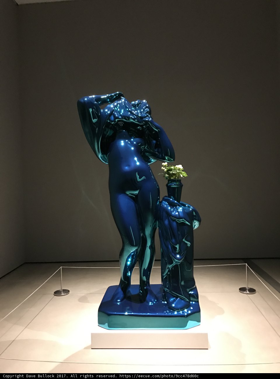 Woman atop Blue Statue