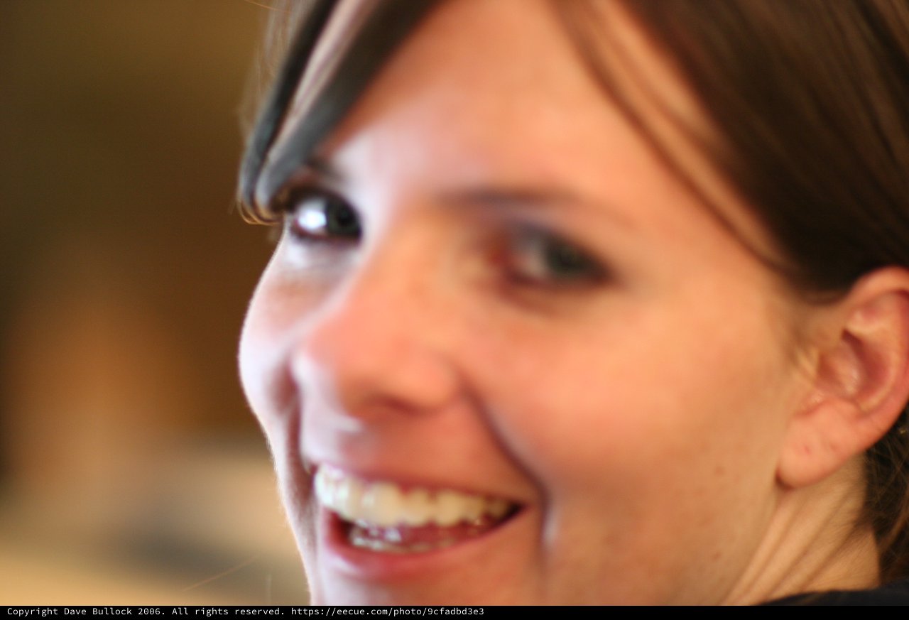 Joyful Young Woman Laughing in Candid Portrait