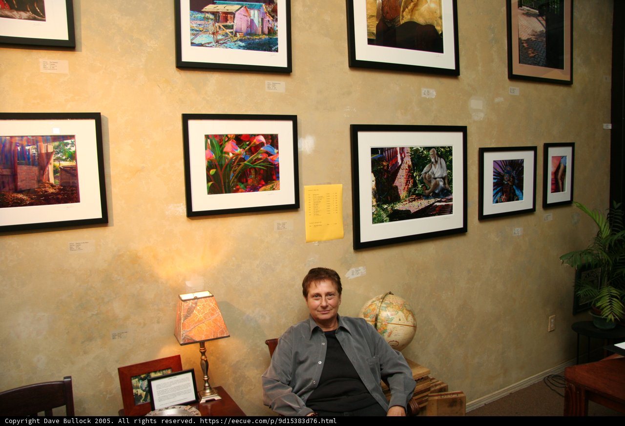 Man Contemplating Art in Gallery