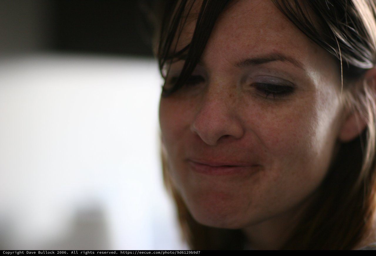Thoughtful Woman in Soft Candid Portrait Light