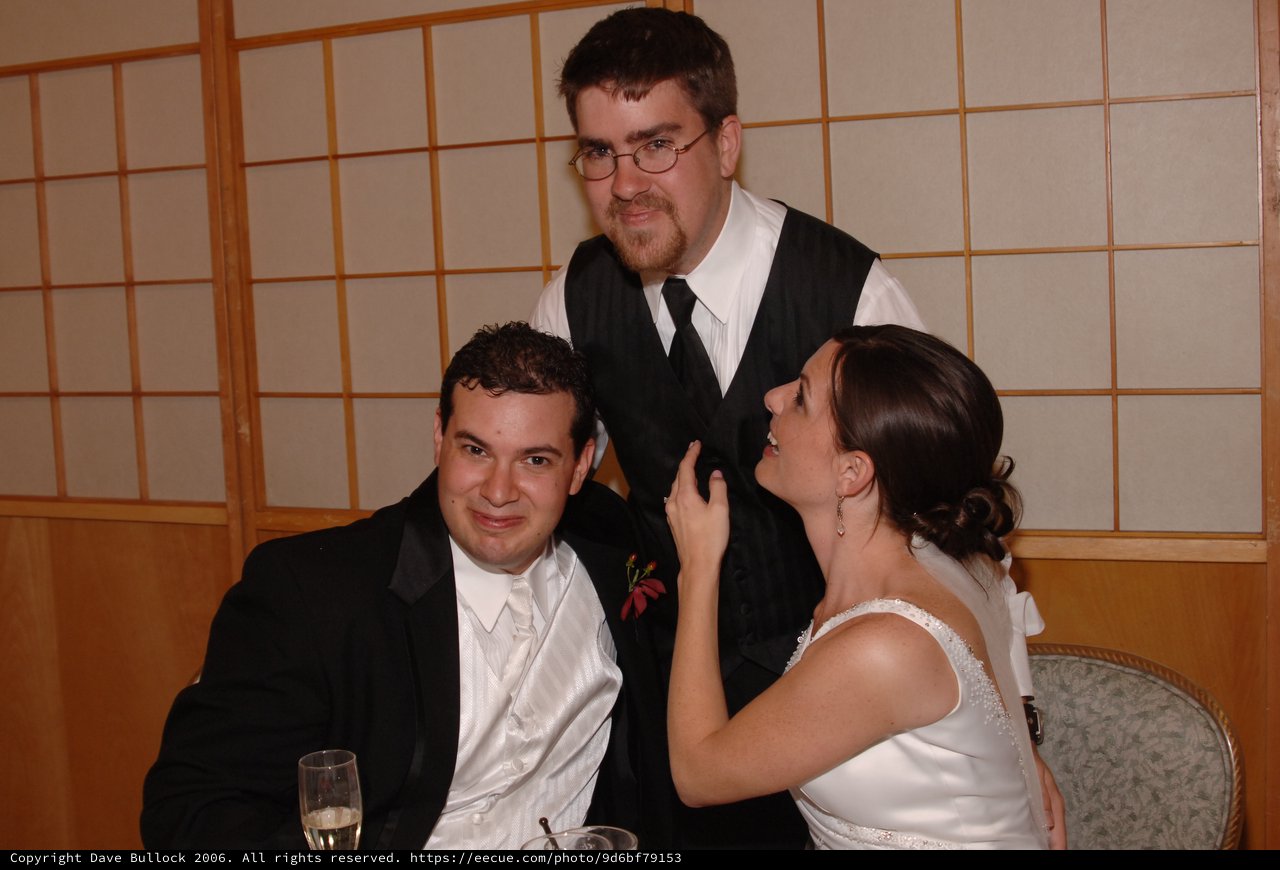 Wedding Reception Trio Sharing a Joyful Moment