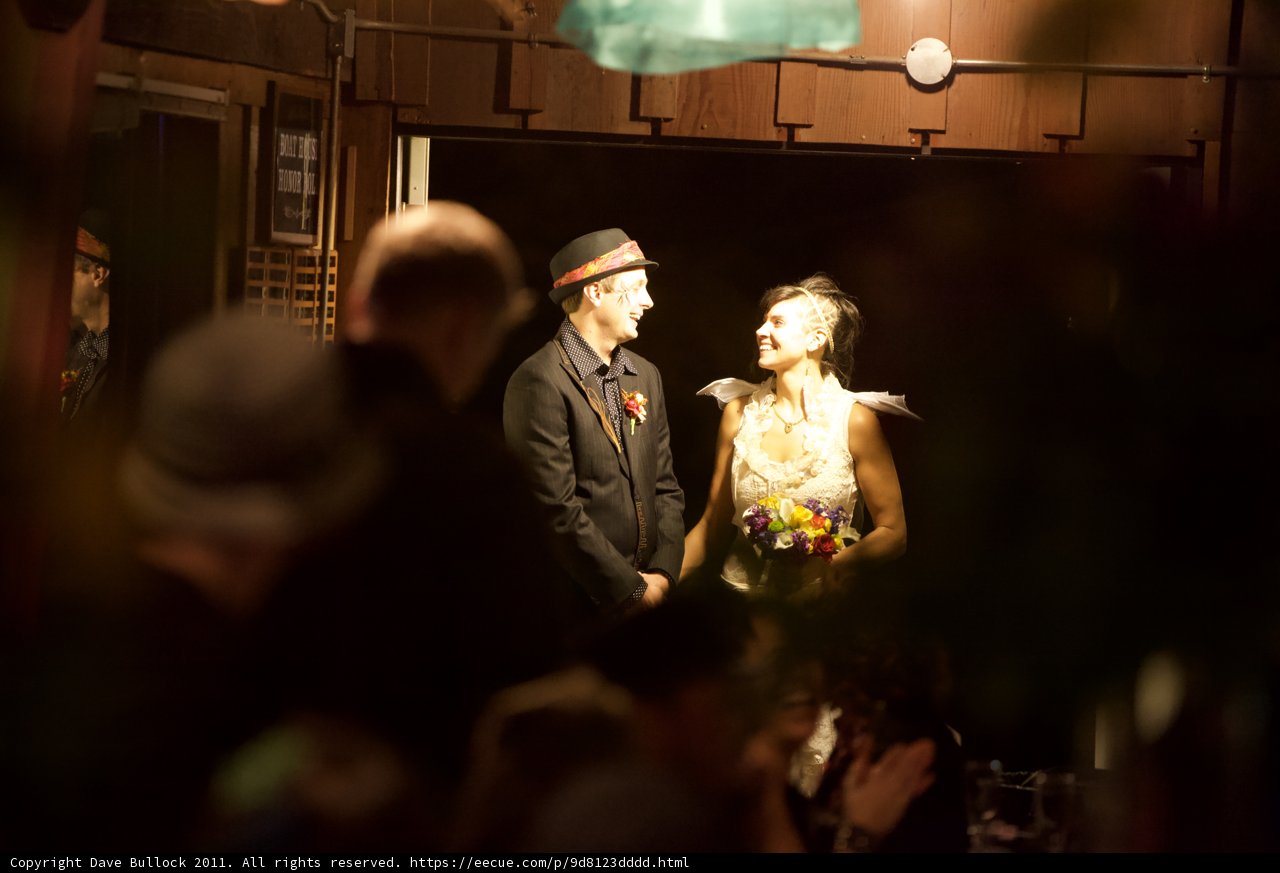 Formal wedding attire outside pub