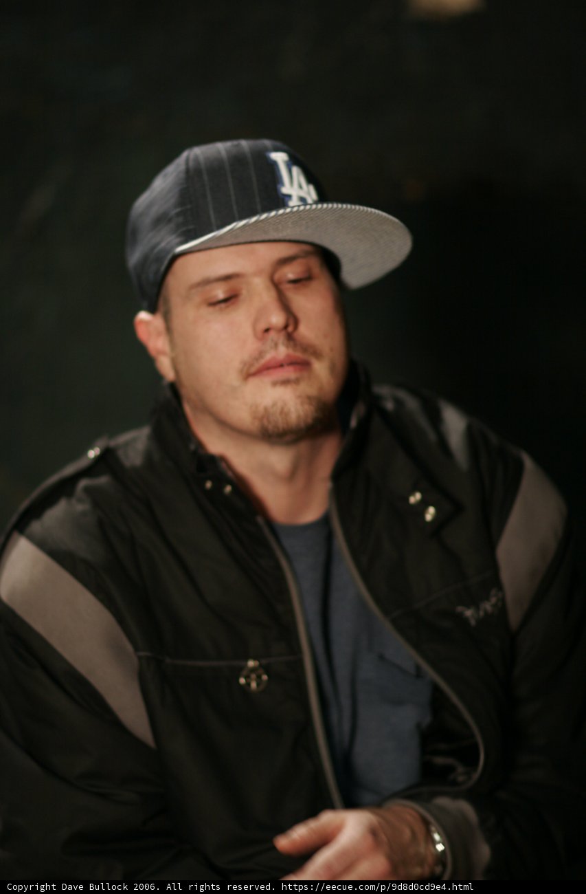 Man in Jacket and Baseball Cap