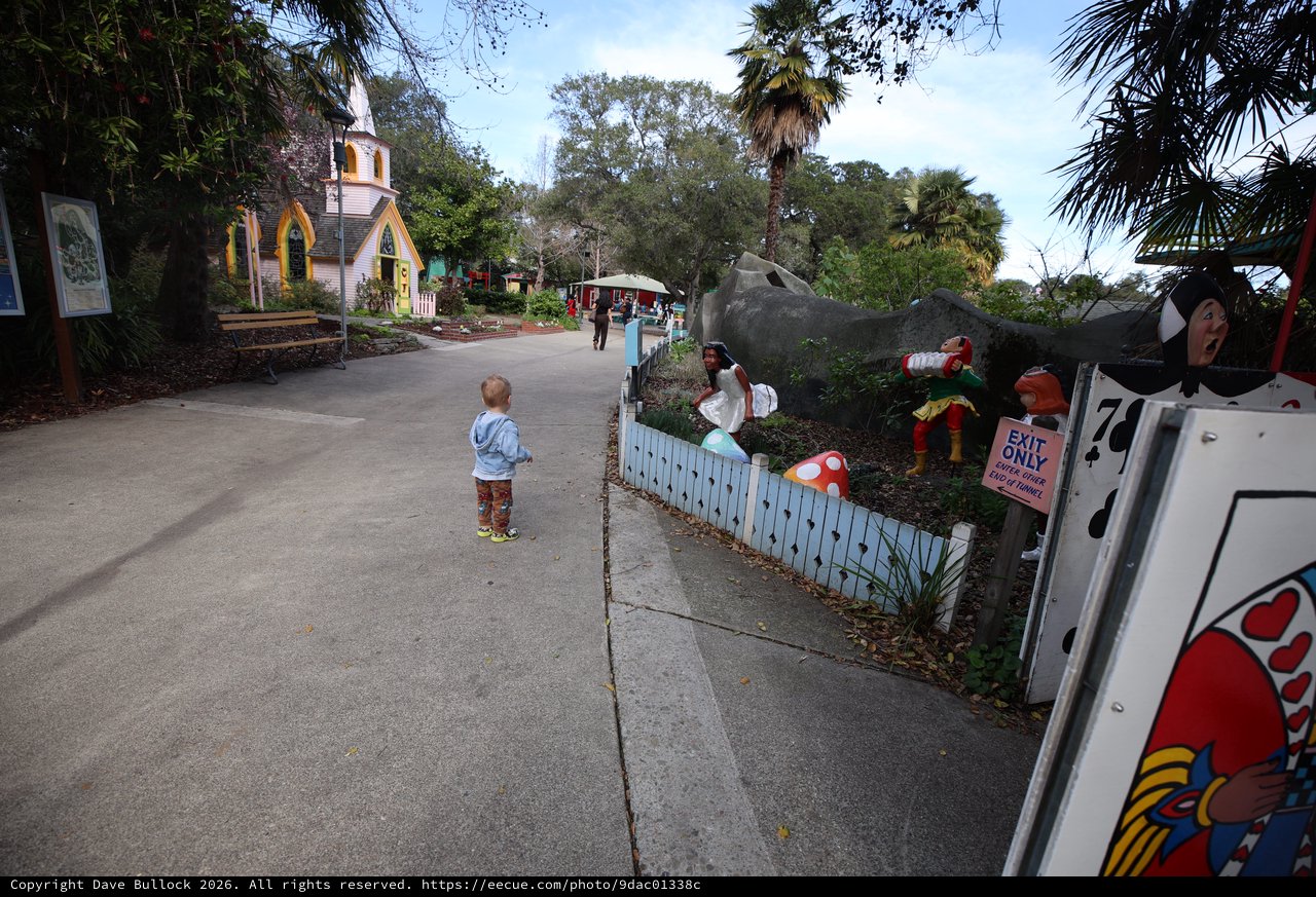 Child Exploring Whimsical Storybook Village Path