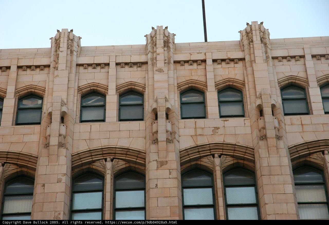 Arched Windows at the Top of a City Building