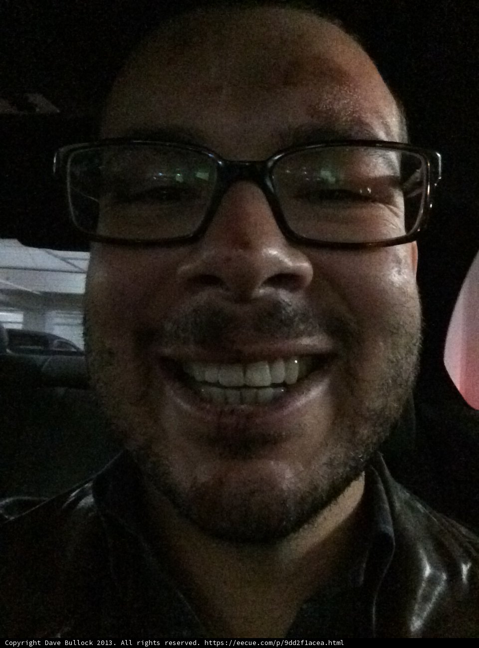 Smiling Dave in his Glasses and Jacket