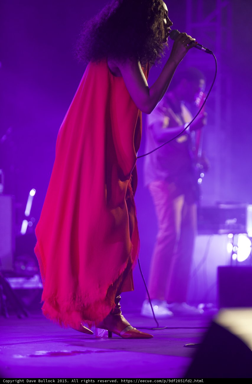 Solange Full Body Profile Red Dress Boots Guitarist Purple Haze