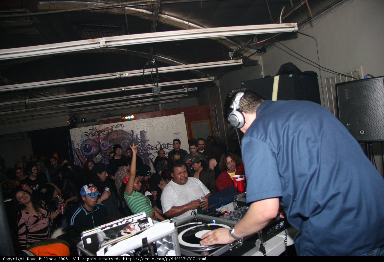 Timmy Trumpeter Mixing Tracks with Headphones