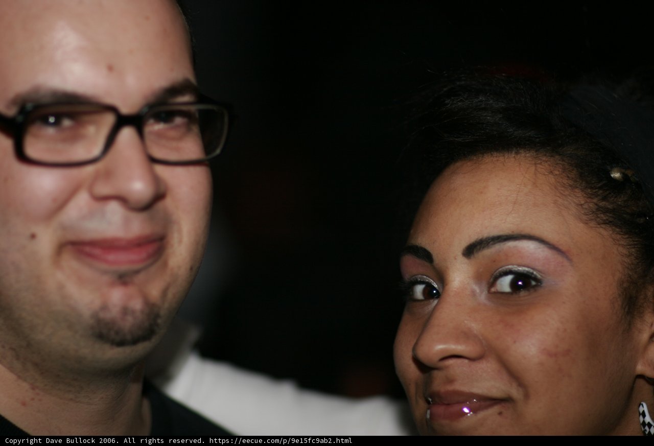 Smiling Duo Sporting Eyeglasses