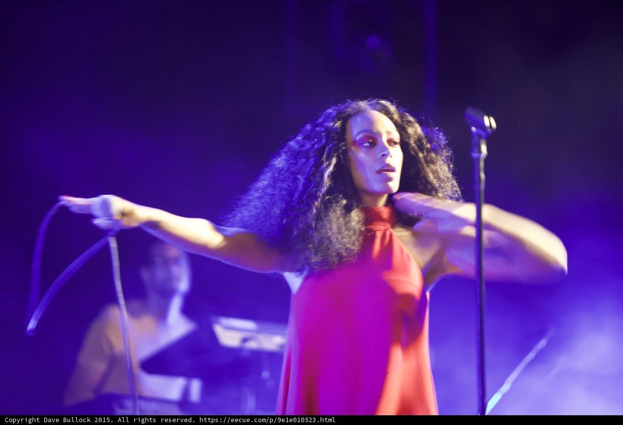Solange Arms Extended Dance Pose Keyboardist Purple