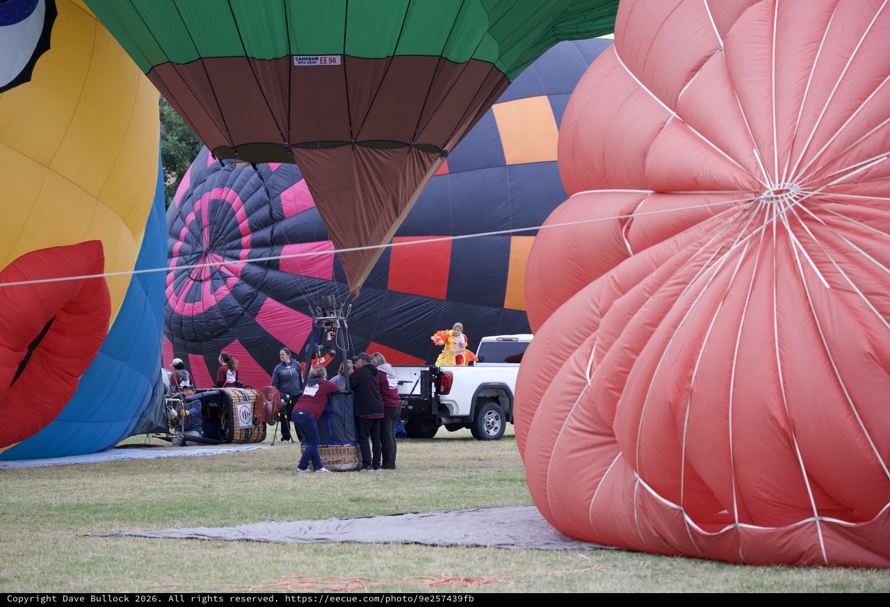 Ground Crew Inflates Balloons at Hot Air Festival
