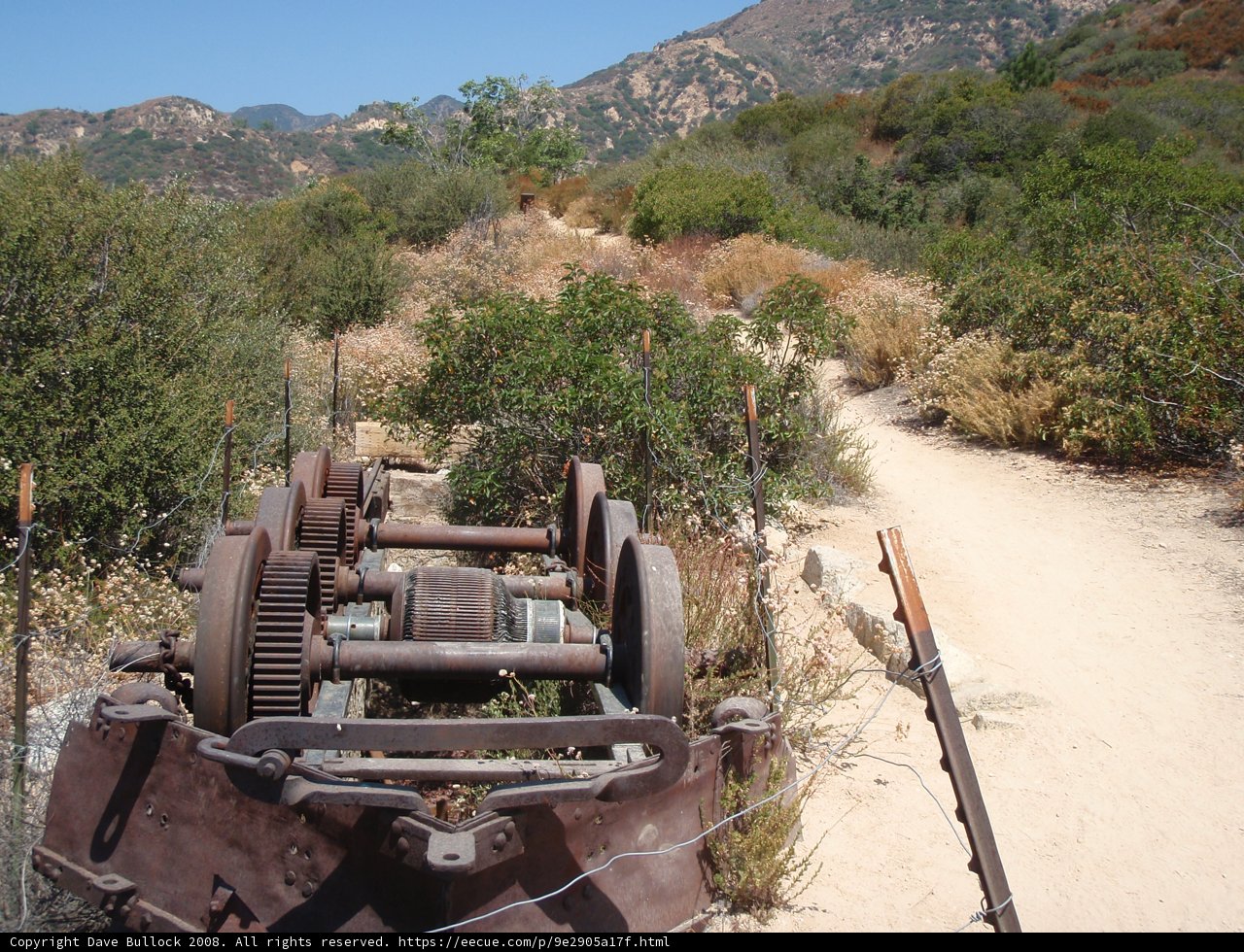 Rusty Three-Wheeled Machine on Dirt Path