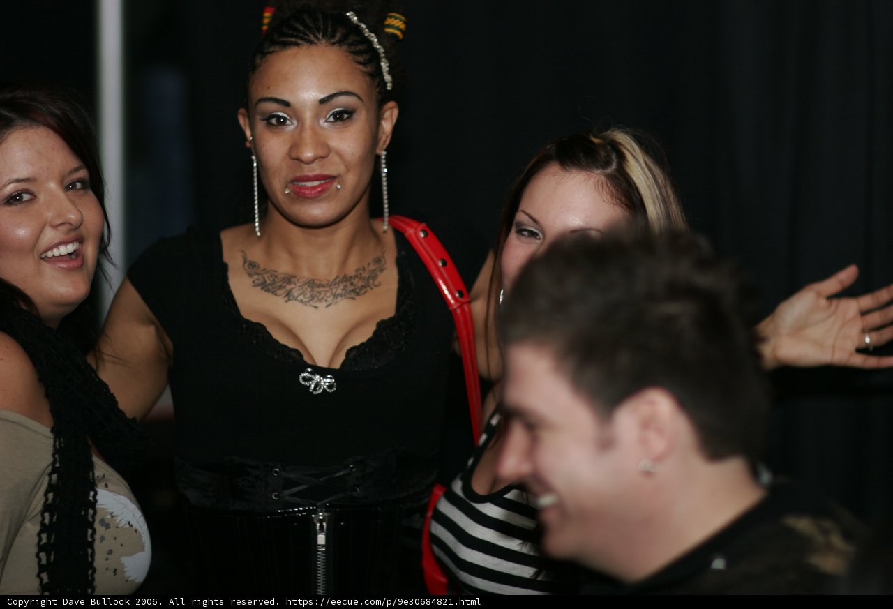Tattooed Woman and Male Companion at a Night Club