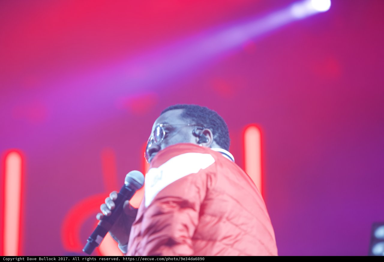 Red Jacketed Man on Stage