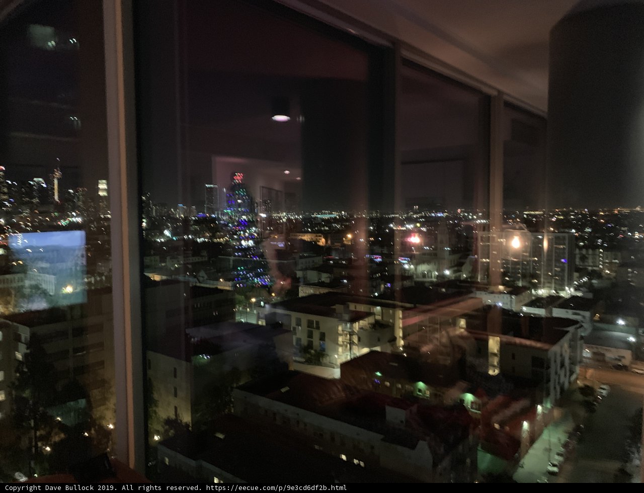 City Nightscape from High-Rise Window