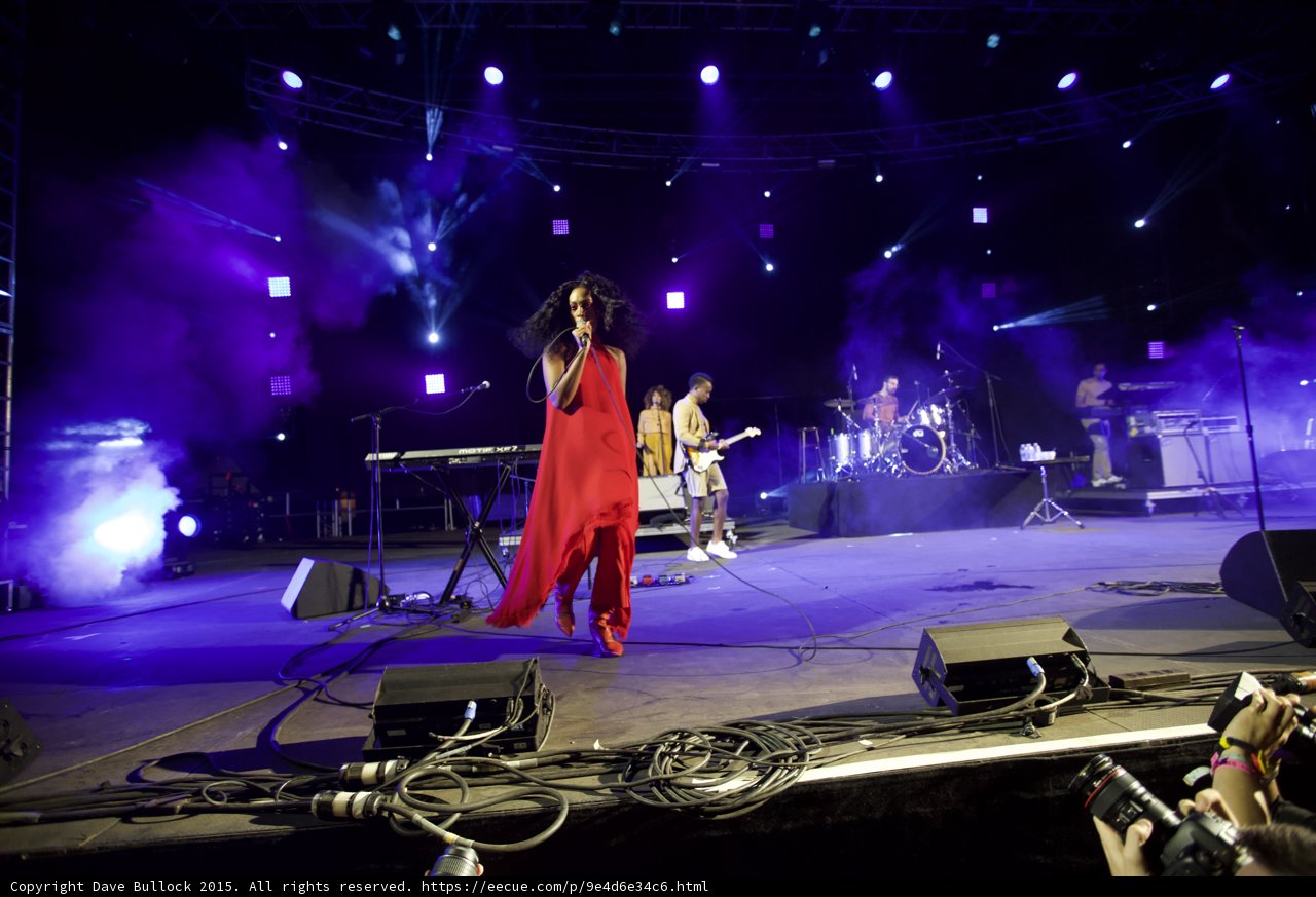 Solange Standing Red Dress Band Behind Purple Blue